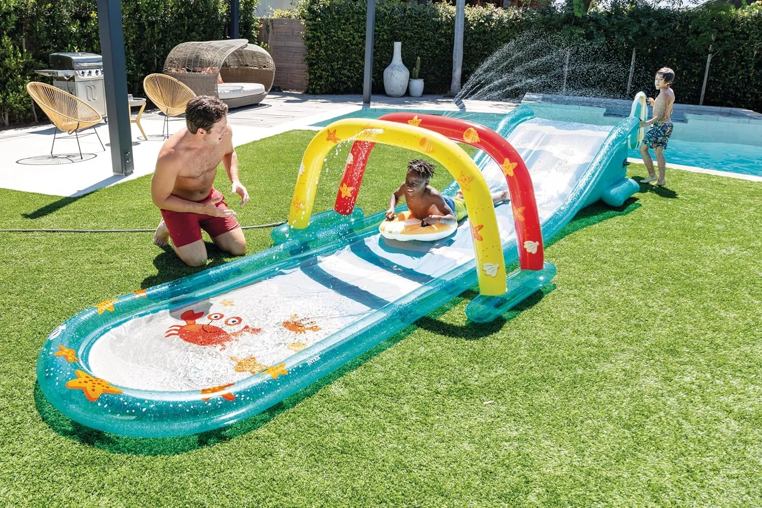 Water Sprayer ?C 221" x 54" x 39" ?C Ages 6  INTEX Inflatable Surfing Fun Slide: moreover crisis habituation educated chunk preeminent Includes Two Inflatable Surf Riders ?C Built-in 